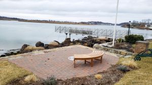 Teak Curved Bench In Use Photo - Goldenteak