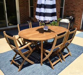 Teak Captiva Oval Table and 4 Teak Providence Navy Sling Side Chairs and 2 Providence Navy Sling Chairs Customer Photo Goldenteak